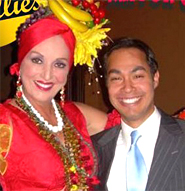 San Antonio Mayor Julian Castro poses with attorney Rosa Cabezas-Gil who plays Carmen Miranda in the "Ethics Follies."