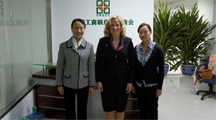 In Beijing in October, Sharon Schweitzer met with Nie Meisheng (left), president of the China Real Estate Chamber of Commerce, and Hao Yan (right), director of the chamber's International Affairs Department. 