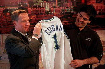 Cuban and Perot in happier times during Cuban's 2000 purchase of the Mavericks.  Photo courtesy of dallasnews.com