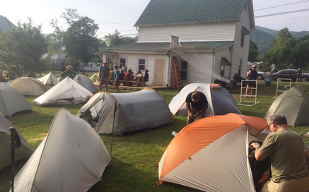 The backyard of Woodchuck Hostel in Damascus, VA, where Lynn stayed during Trail Days, an annual festival that celebrates the Appalachian Trail. Lynn's tent on left of orange one in the foreground.