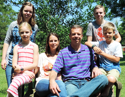 Ayse and Cliff Vrielink with Olivia, 15, Sophia, 9, William, 14, and August, 11.