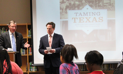 Texas Supreme Court Justice Jeff Brown and Houston attorney Warren Harris conduct a Teach Texas class at the Gregory-Lincoln Education Center in Houston.