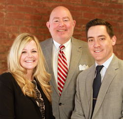 George Parker Young (middle) with law partners Kelli Walter and Vinny Circelli.